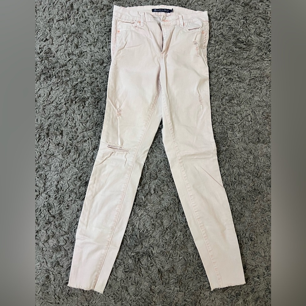 Baby pink skinny jeans